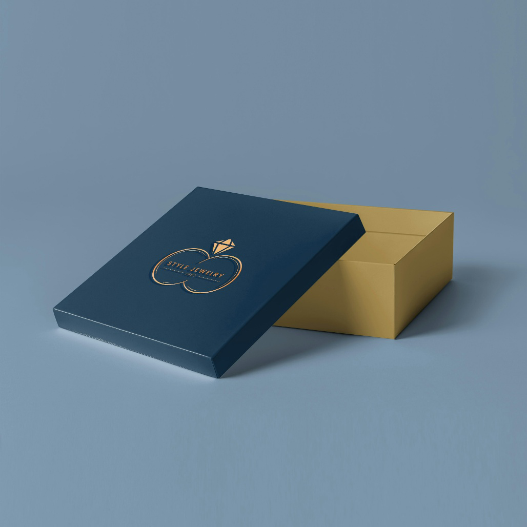 A teal and tan jewelry box